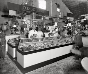old Black and white photo of butcher counter at Collins Meat Market